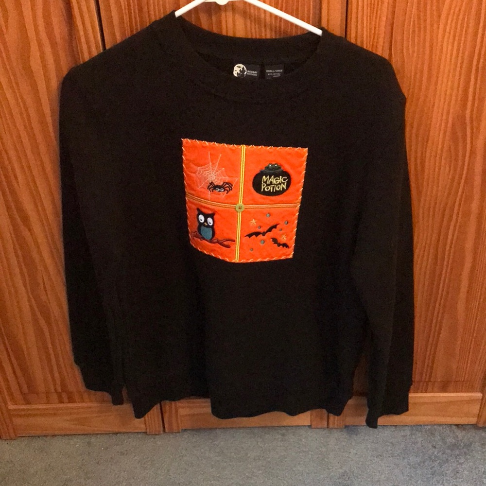 Women’s black and orange vintage Halloween embroidery crewneck fleece inside